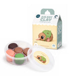 Load image into Gallery viewer, A children's air dry clay kit by Kuwi Clay, featuring a clear plastic tub of six coloured clay balls and its illustrated retail box on a white background.
