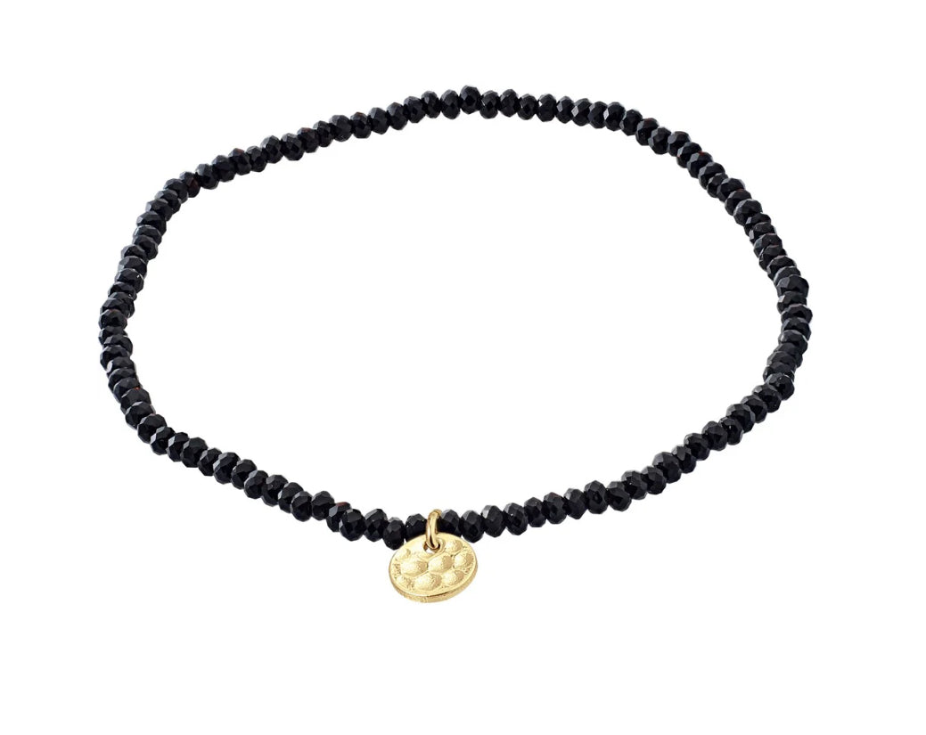 Indie bracelet black and gold.